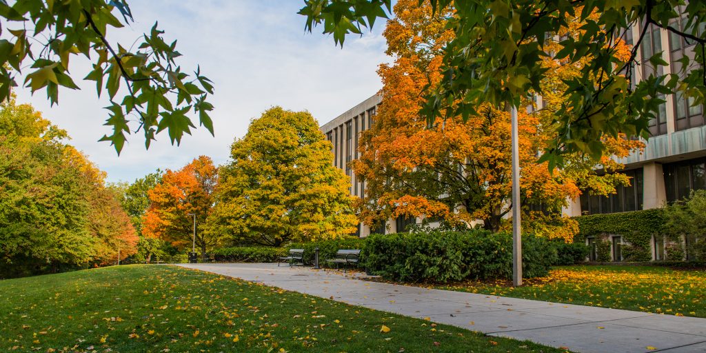 Hannah Administration Building surrounded by fall colored trees