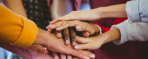 Focus on hands together at work