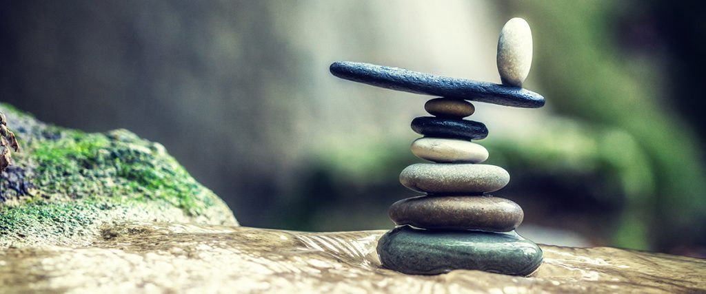 a stack of flat stones stacked in nature